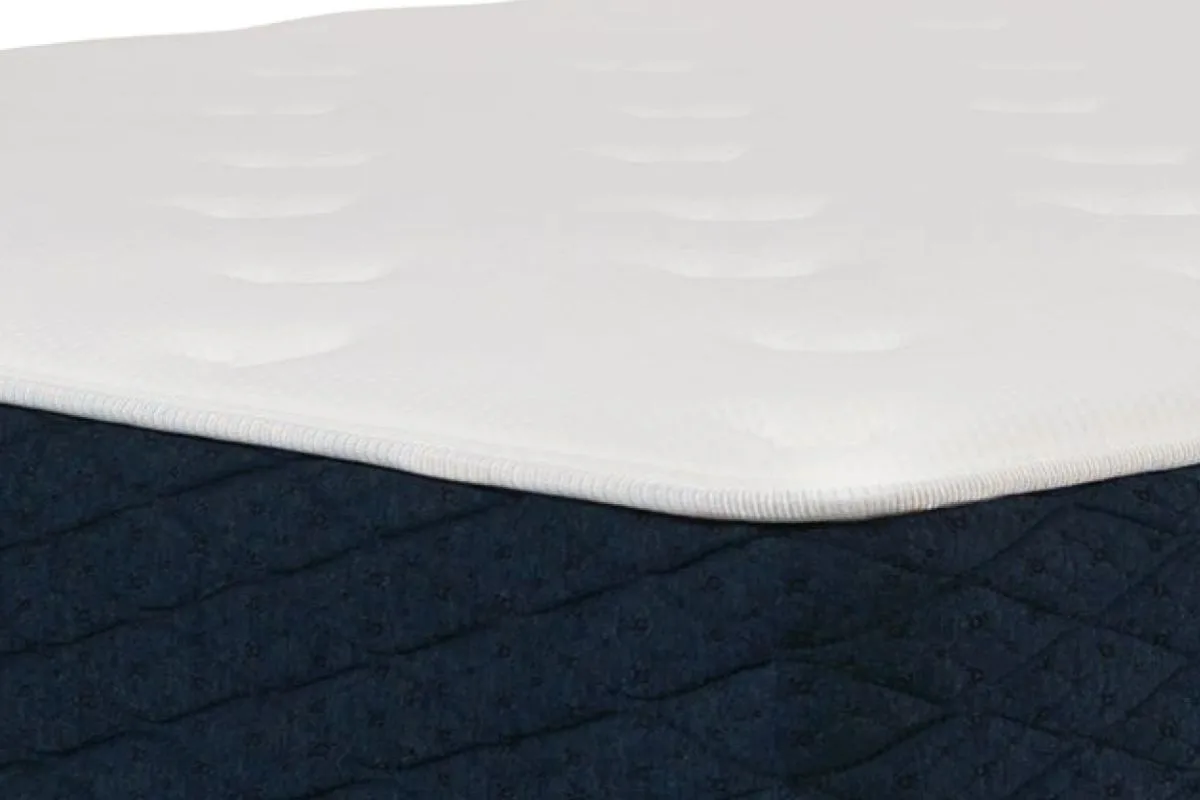 Close-up of Brooklyn Bedding Signature Hybrid mattress cover highlighting breathable and skin-safe fabric materials