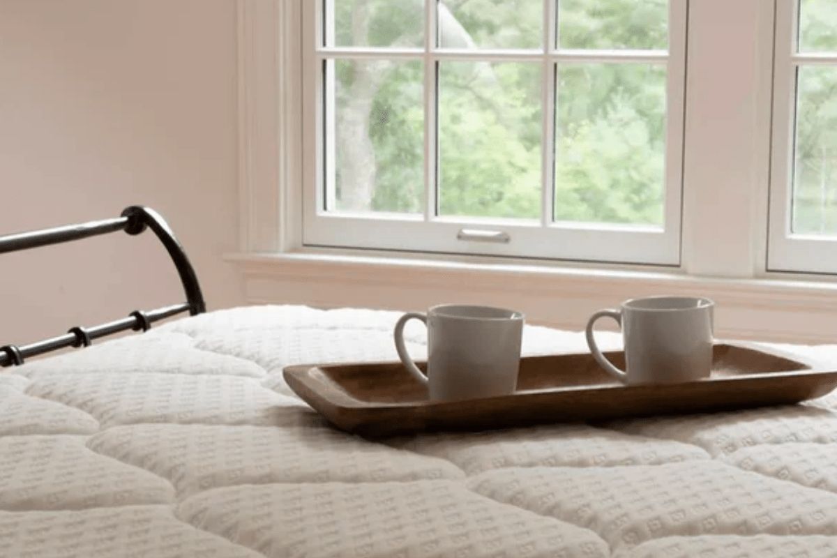 DLX Premier Hybrid mattress surface showing condition requirements before return