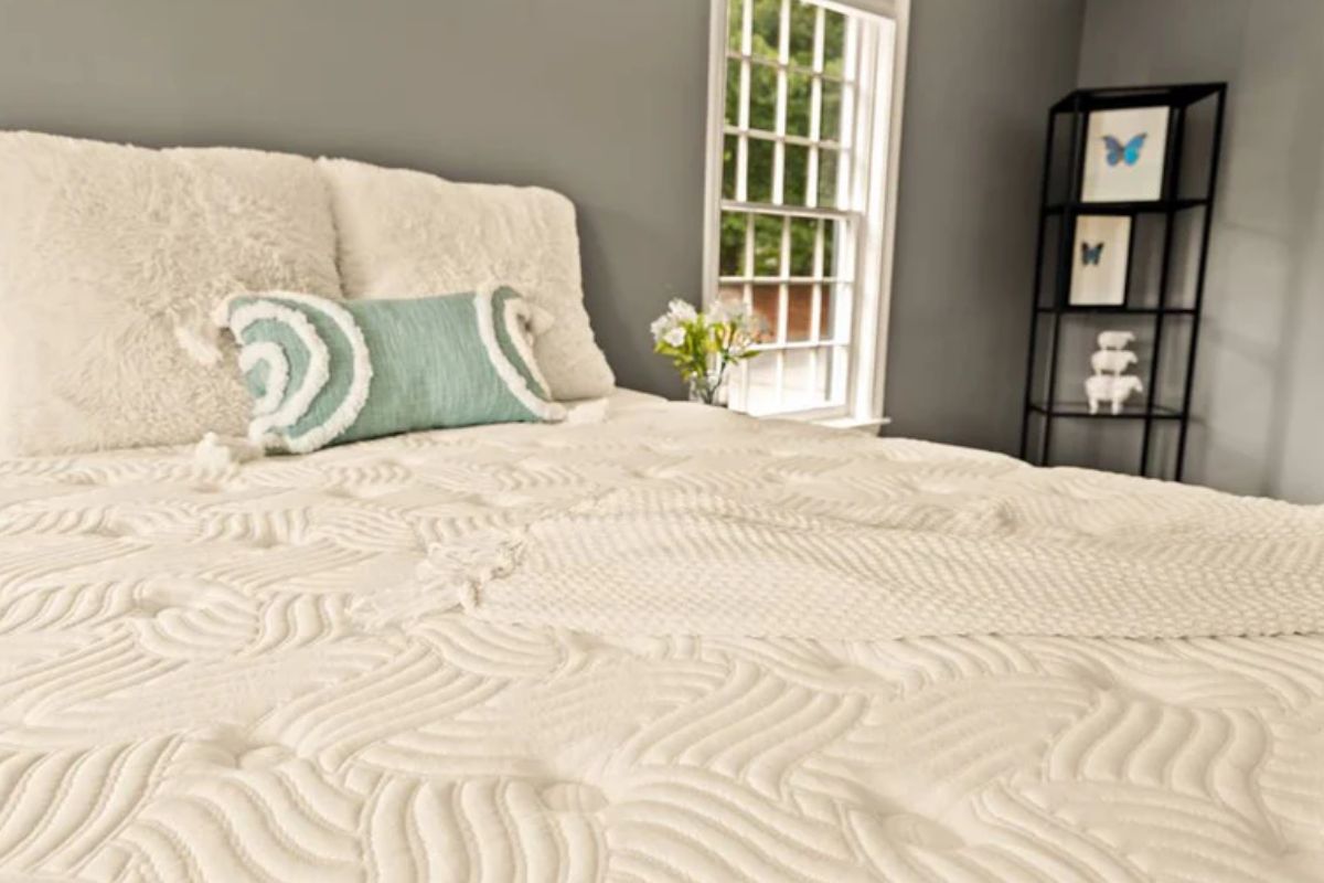 Close-up of DLX Premier Hybrid mattress surface showing quilting and feel reported in user reviews