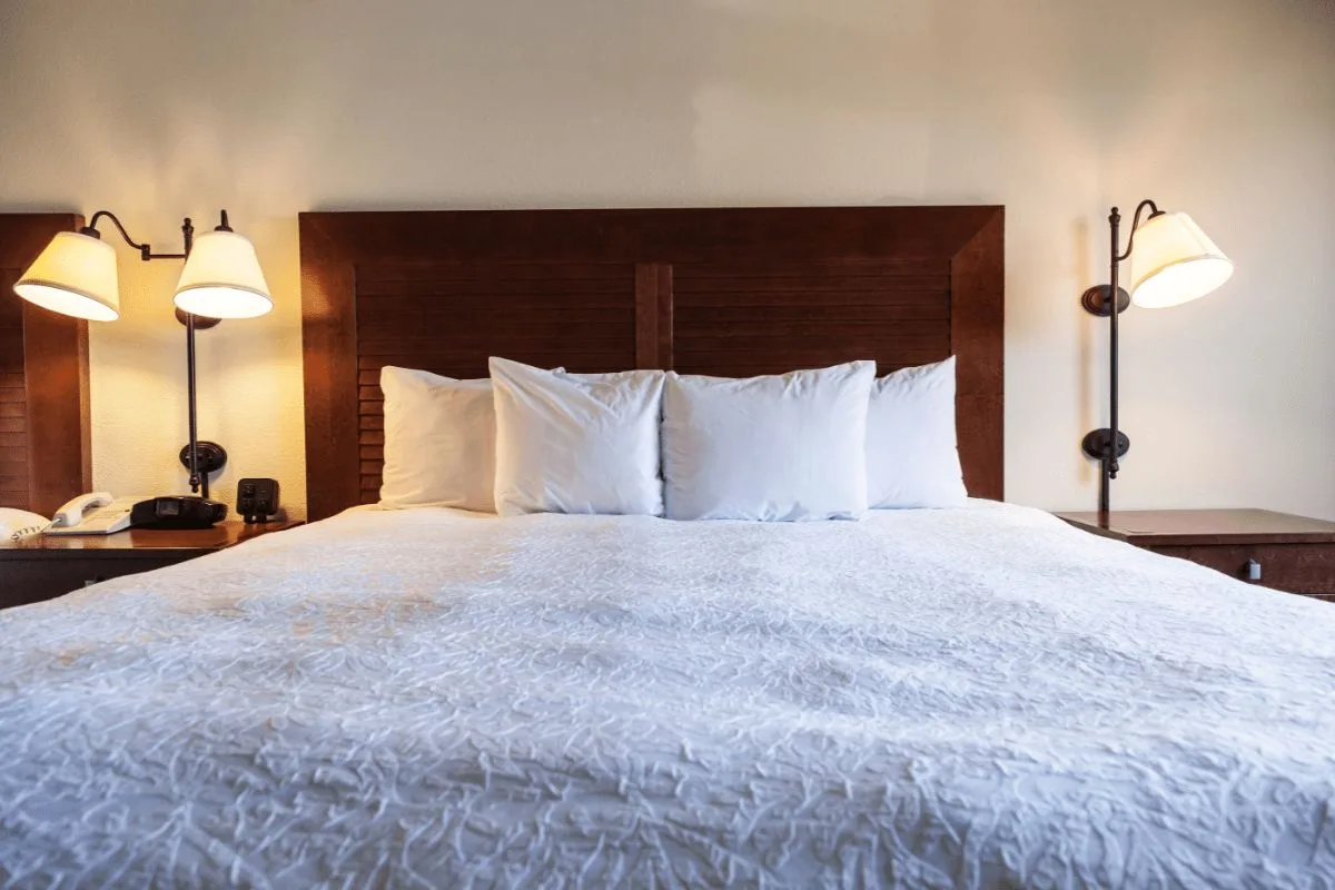 Standard king size bed setup showing width and sleeping space for two people