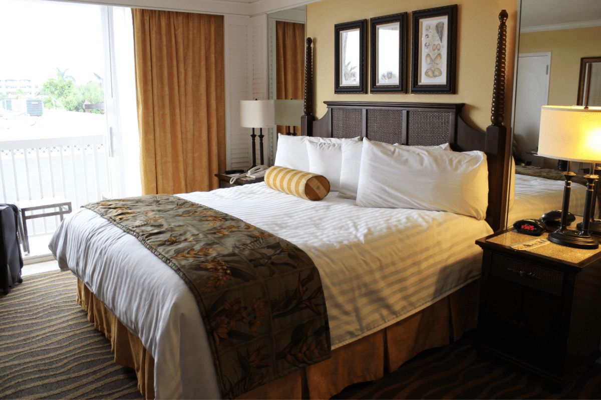 Standard king size bed height in bedroom showing typical mattress and box spring combination