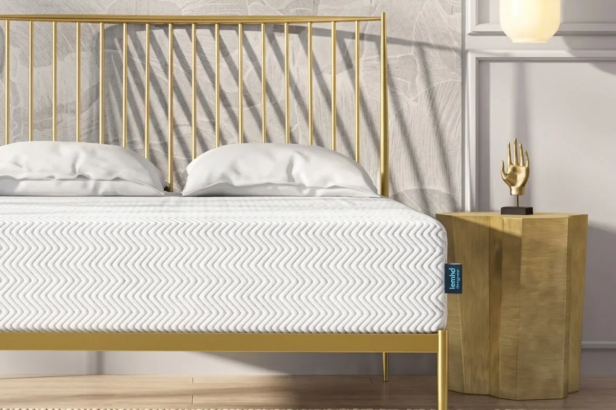 Leesa Legend Hybrid mattress on gold bed frame with textured cover and minimalist bedroom decor