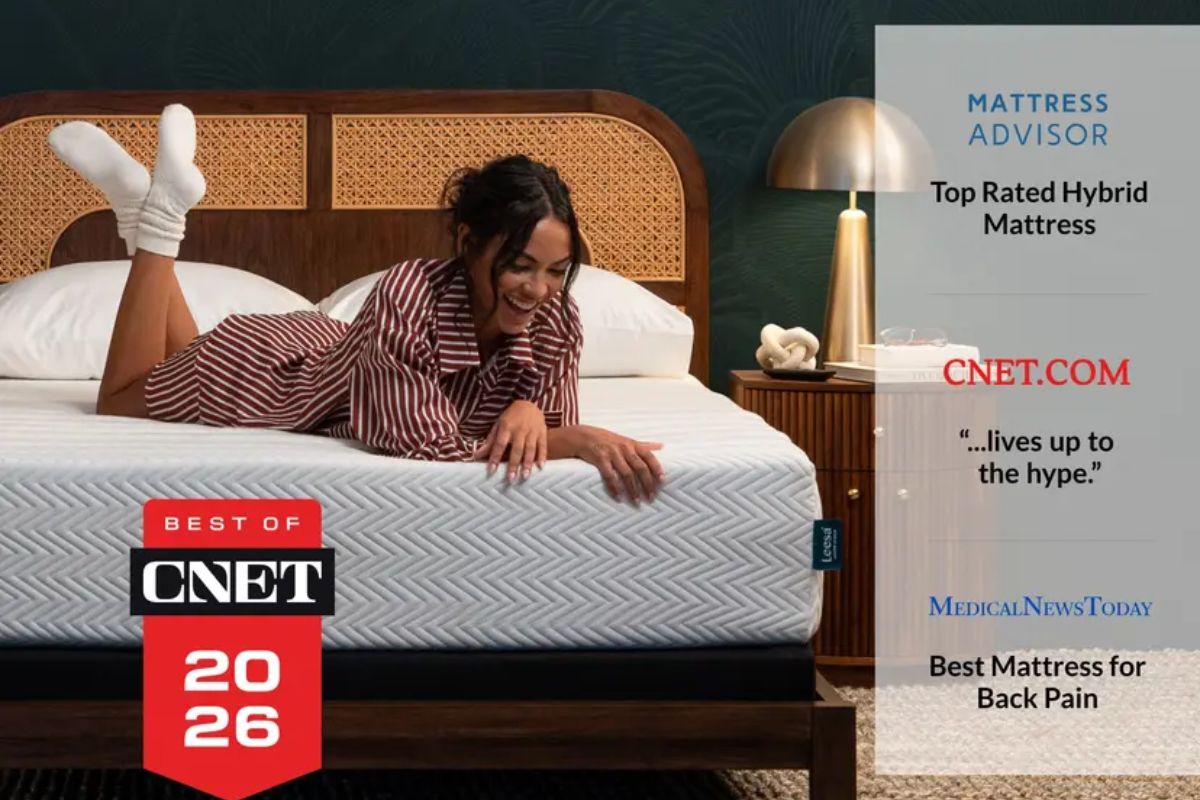 A woman laying down on the Leesa Legend Hybrid mattress with accolades: best of CNET 2026, Mattress Advisor top rated hybrid mattress, CNET.com "lives up to the hype" and Medical New Today best mattress for back pain.