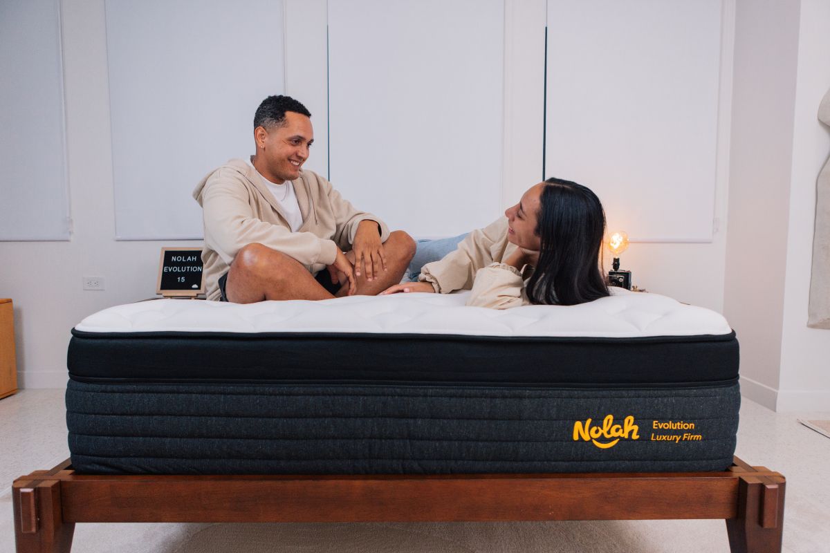 A man and a woman on a Nolah Evolution 15".