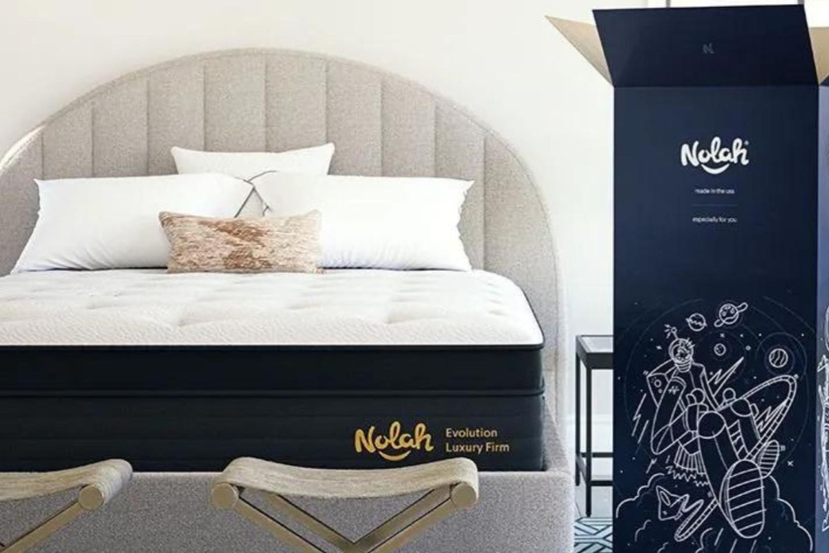 Nolah Evolution 15 mattress next to original shipping box illustrating return and pickup process