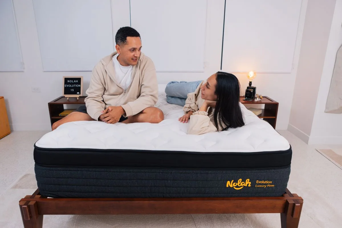 A man and a woman on a Nolah Evolution 15".