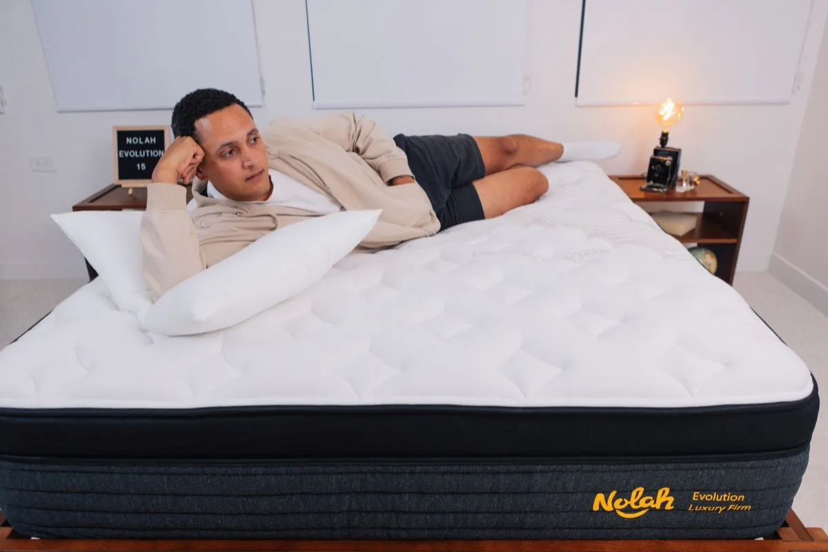 A man lying down on a Nolah Evolution 15".