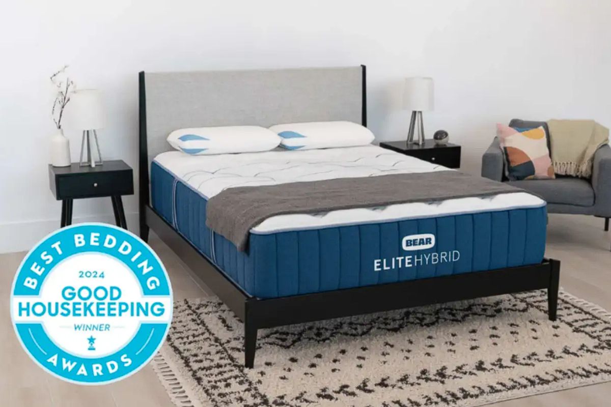 Bear Elite Hybrid mattress on bed with Good Housekeeping award badge highlighting trusted performance and customer satisfaction