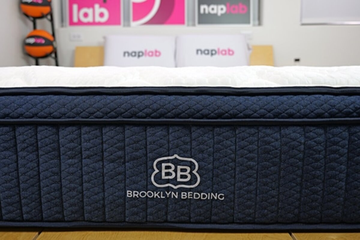 Brooklyn Bedding mattress in testing studio with quilted side design and visible brand logo