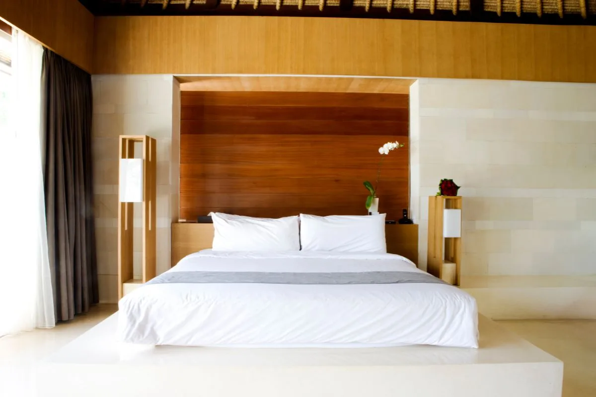 Modern king size bed illustrating standard mattress length in a contemporary bedroom