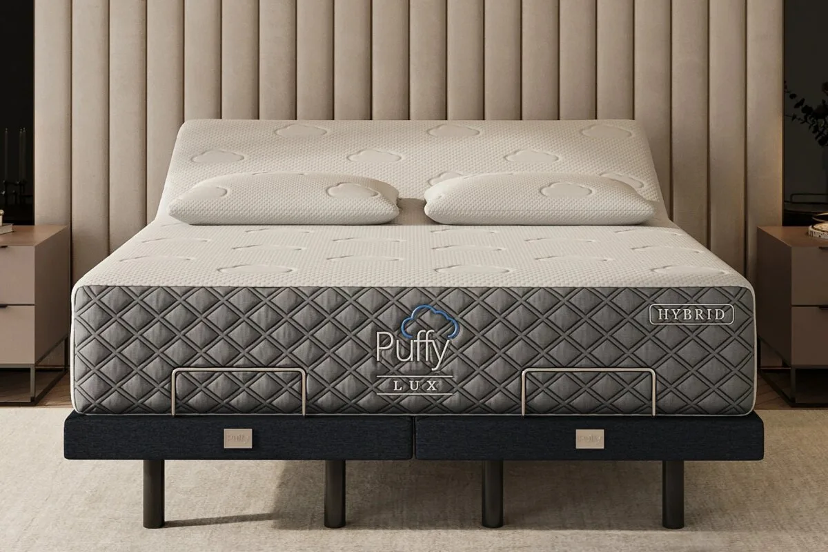 Front view of Puffy Lux Mattress on adjustable base with matching pillows in a modern bedroom setup