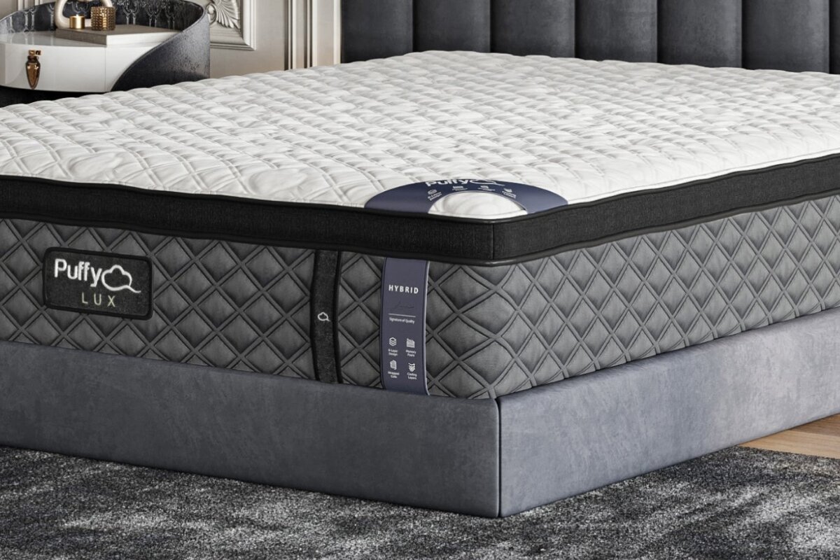 Close-up of Puffy Lux hybrid mattress showing quilted top and side panel design