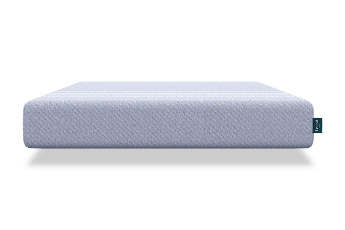 Leesa Studio mattress shown on a simple frame representing the product eligible for return and trial period
