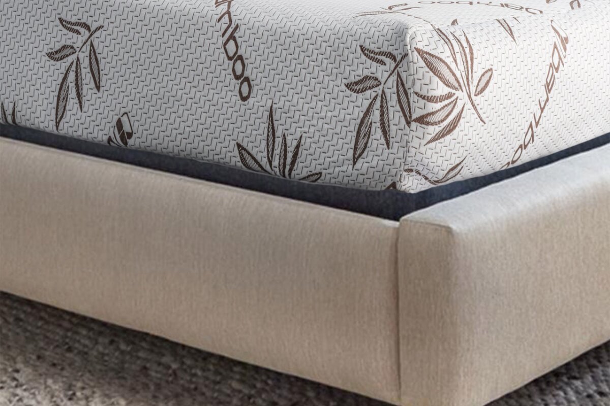 close-up of short queen mattress on rv-friendly upholstered bed frame