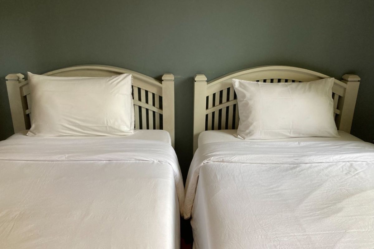 What is the Difference Between a Twin Mattress and a Twin XL? Twin beds placed next to each other demonstrating size and layout differences in real use