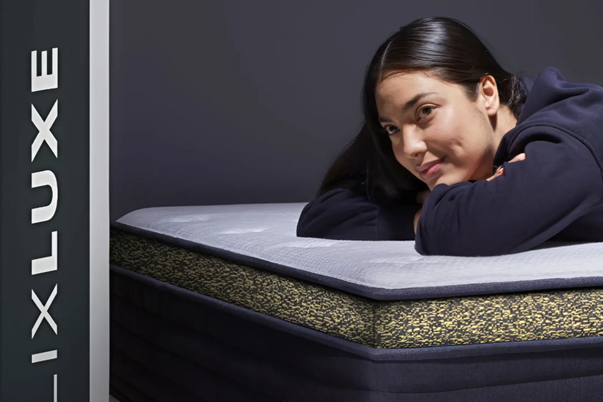 Person resting on Helix Dawn Luxe mattress during home trial before deciding on return