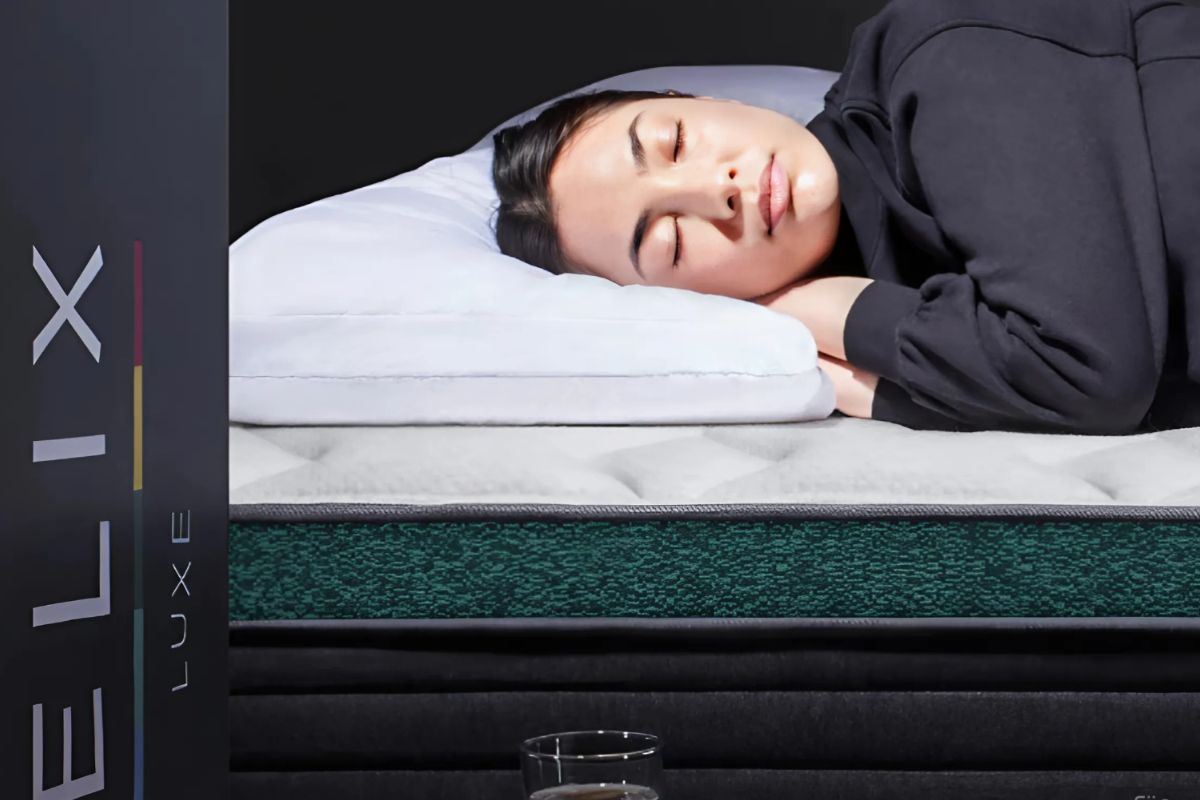 Side sleeper lying on Helix Twilight Luxe mattress showing firmness and comfort feedback