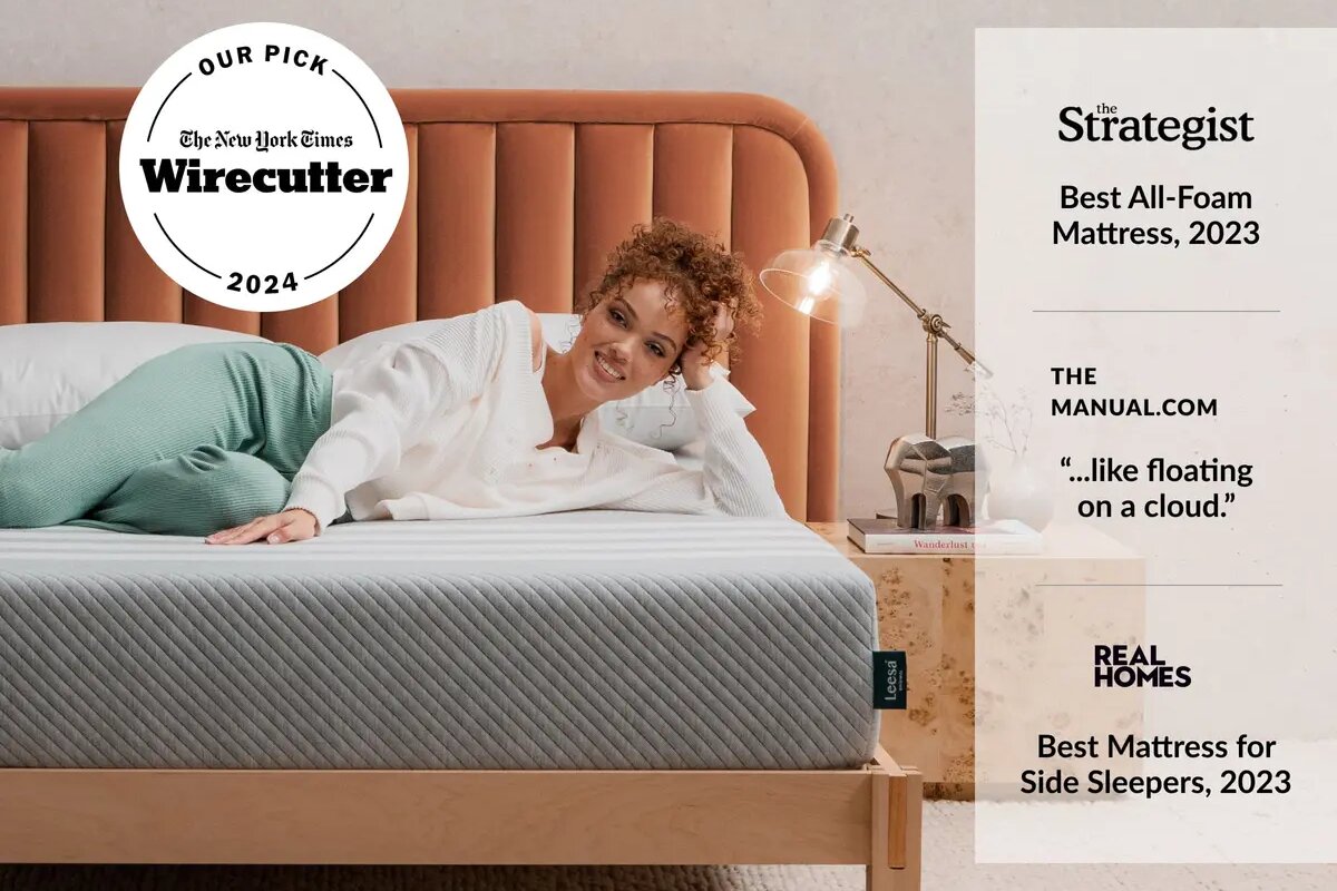 A woman lying down on the Leesa Original Mattress with accolades: The New York Times Wirecutter (our pick 2024), The Strategist (best all-foam mattress 2023), The manual.com (like floating on a cloud), and Real Homes(best mattress for side sleepers 2023).