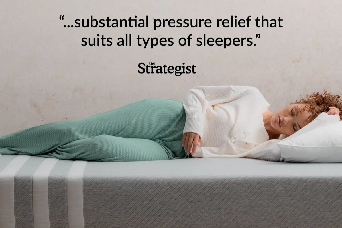 A woman sleeping on the Leesa Original Mattress with a comment from the Strategist "substantial pressure relief that suits all types of sleeper".