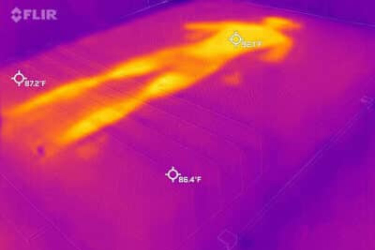 A heat image of a bed where a person laid down, very visible.