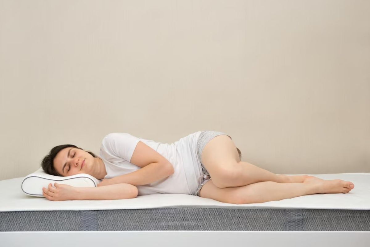 Is a Medium Mattress Good? Side sleeper resting on a medium mattress that provides pressure relief and proper spinal alignment
