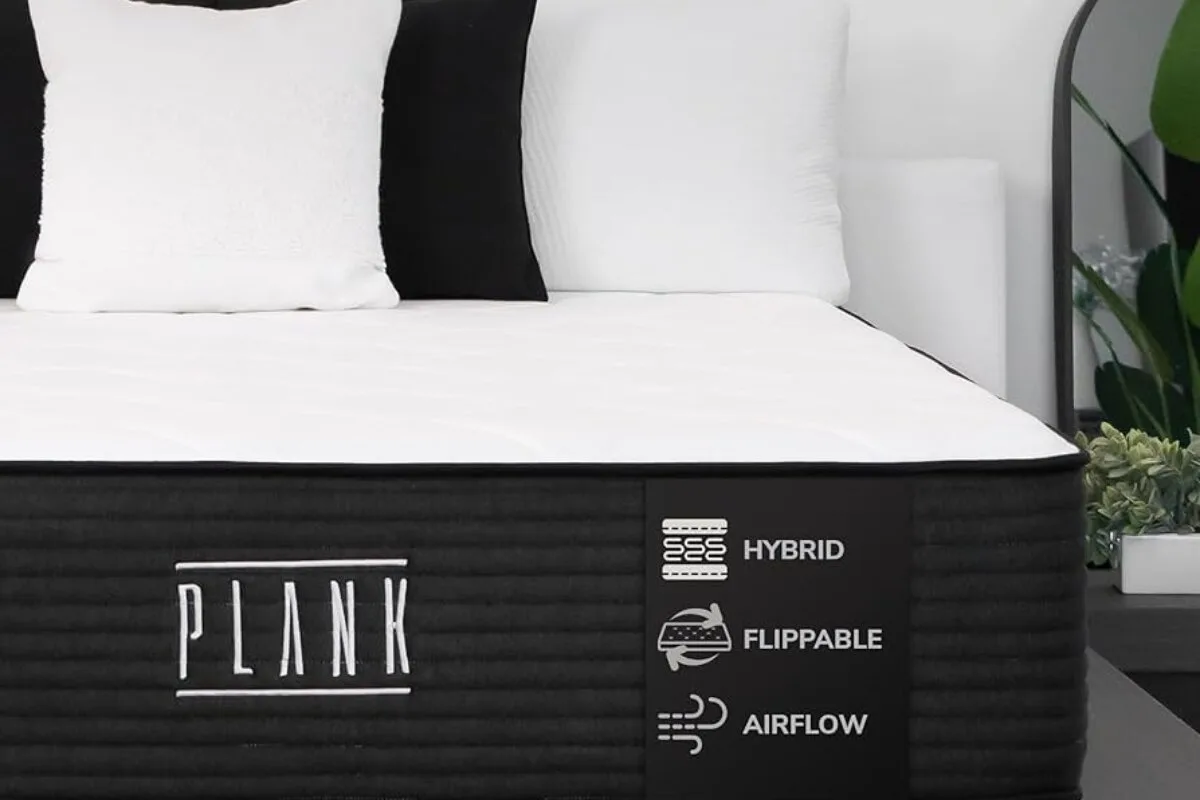 plank firm luxe hybrid mattress with flippable design and airflow features displayed in a modern bedroom setting