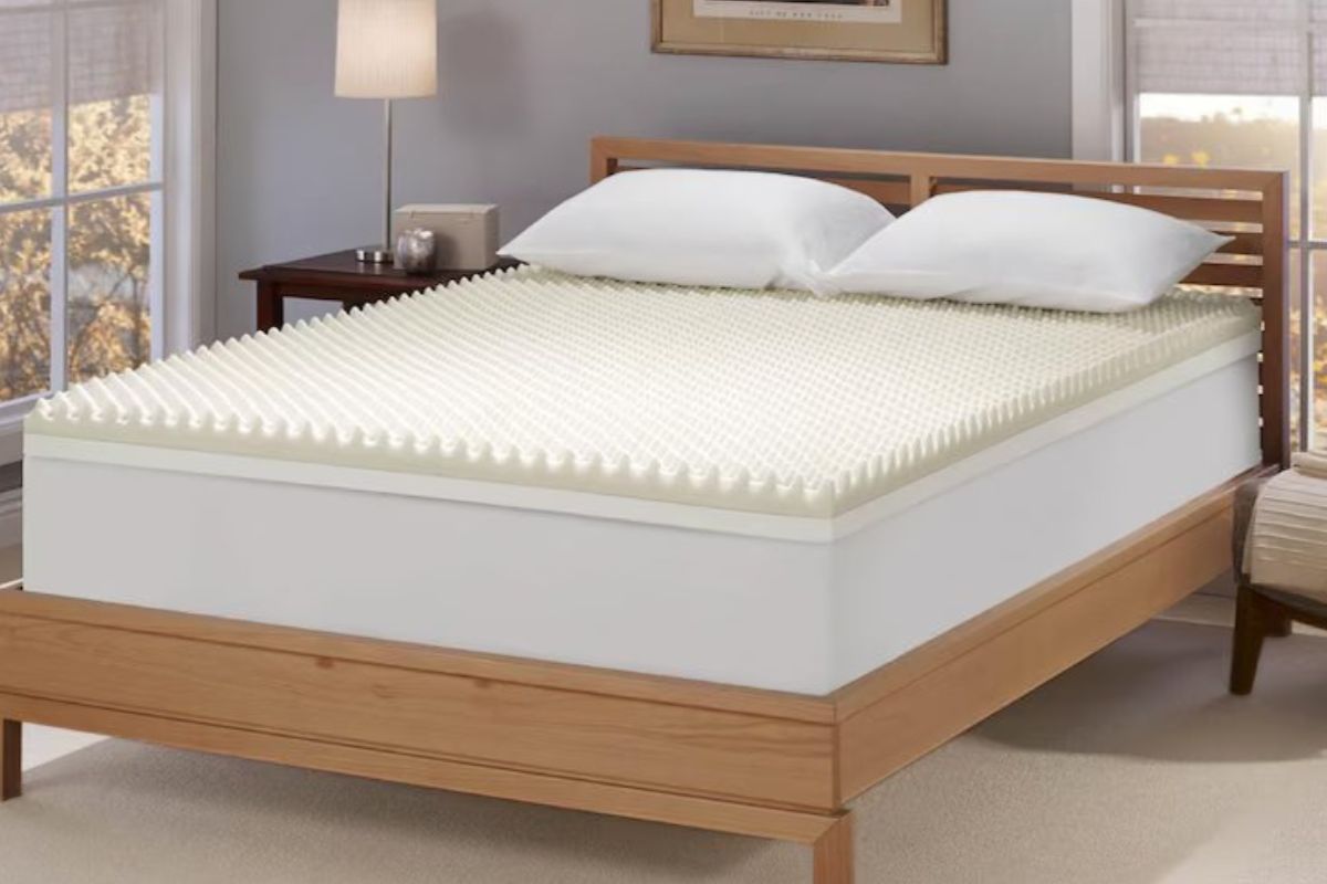 New plush mattress with egg crate foam topper showing firm surface during the mattress break-in period