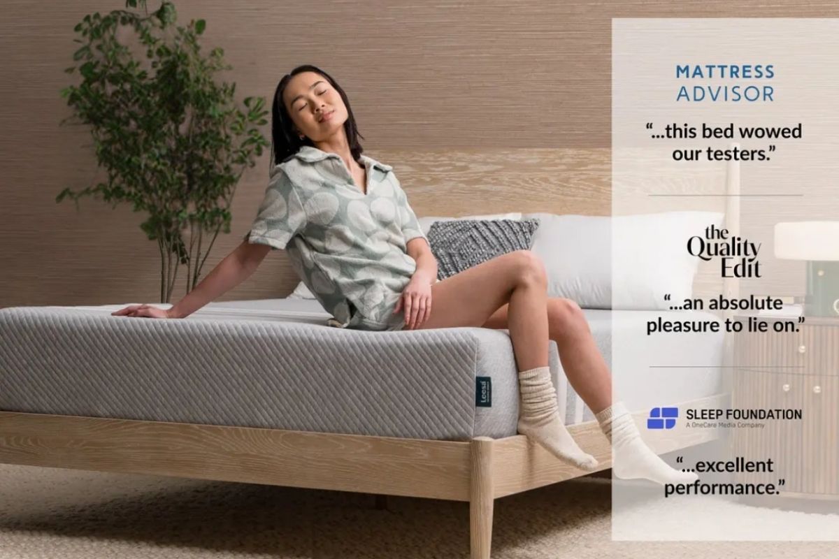 Person relaxing on a supportive mattress highlighting the importance of sleep comfort when dealing with insomnia symptoms