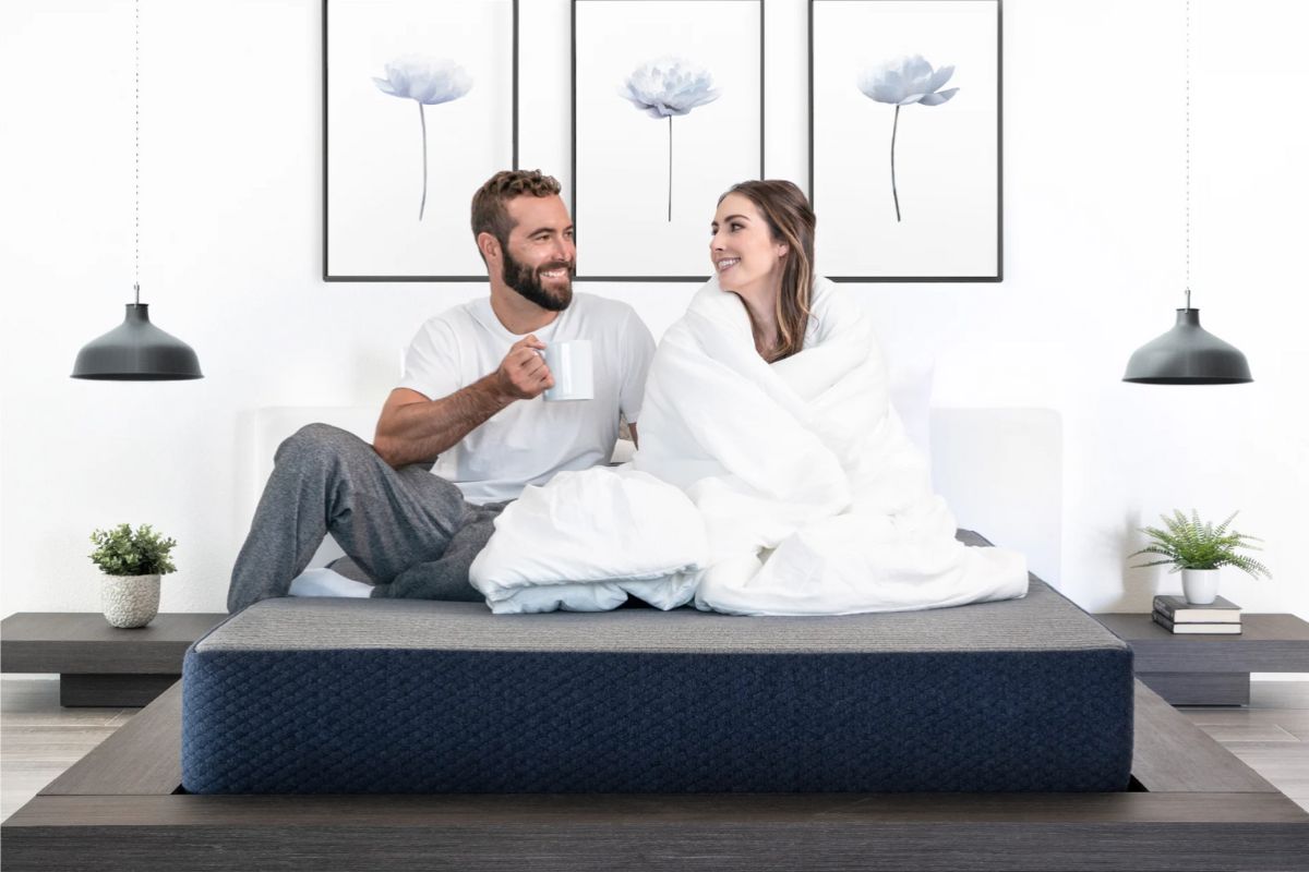 Couple relaxing on a Dreamfoam Essential mattress highlighting overall comfort and common customer satisfaction experiences