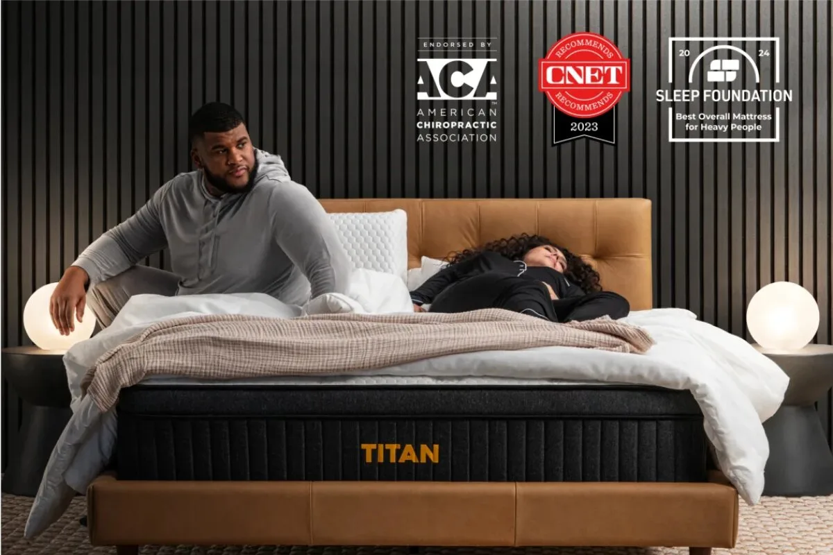 A couple resting on the Titan Plus Luxe mattress with accolades from the American chriopractic association, CNET, and Sleep Foundation.