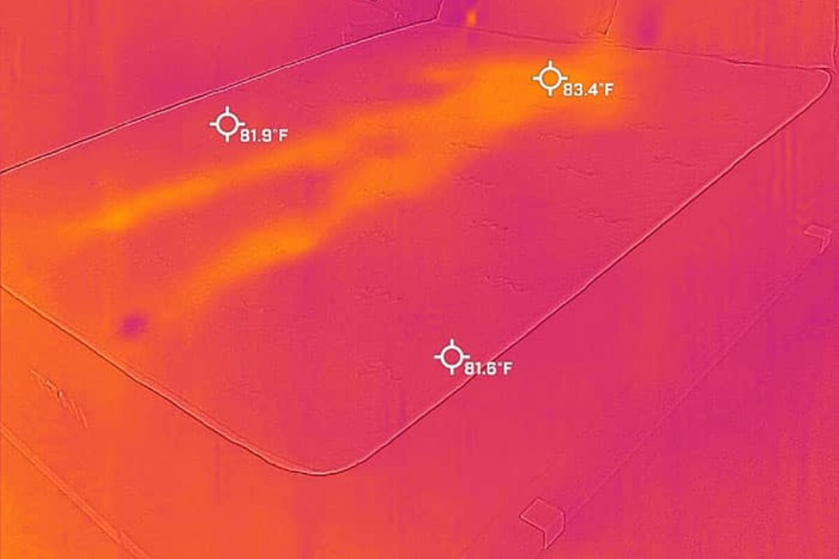 A heat image after a person laid on it, barely visible.