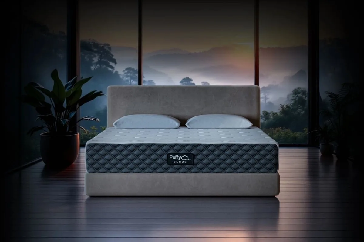 Can’t Sleep? Tips and Remedies to Get Some Sleep Puffy Cloud mattress in a dark sleep-friendly bedroom highlighting a comfortable setup for restful sleep
