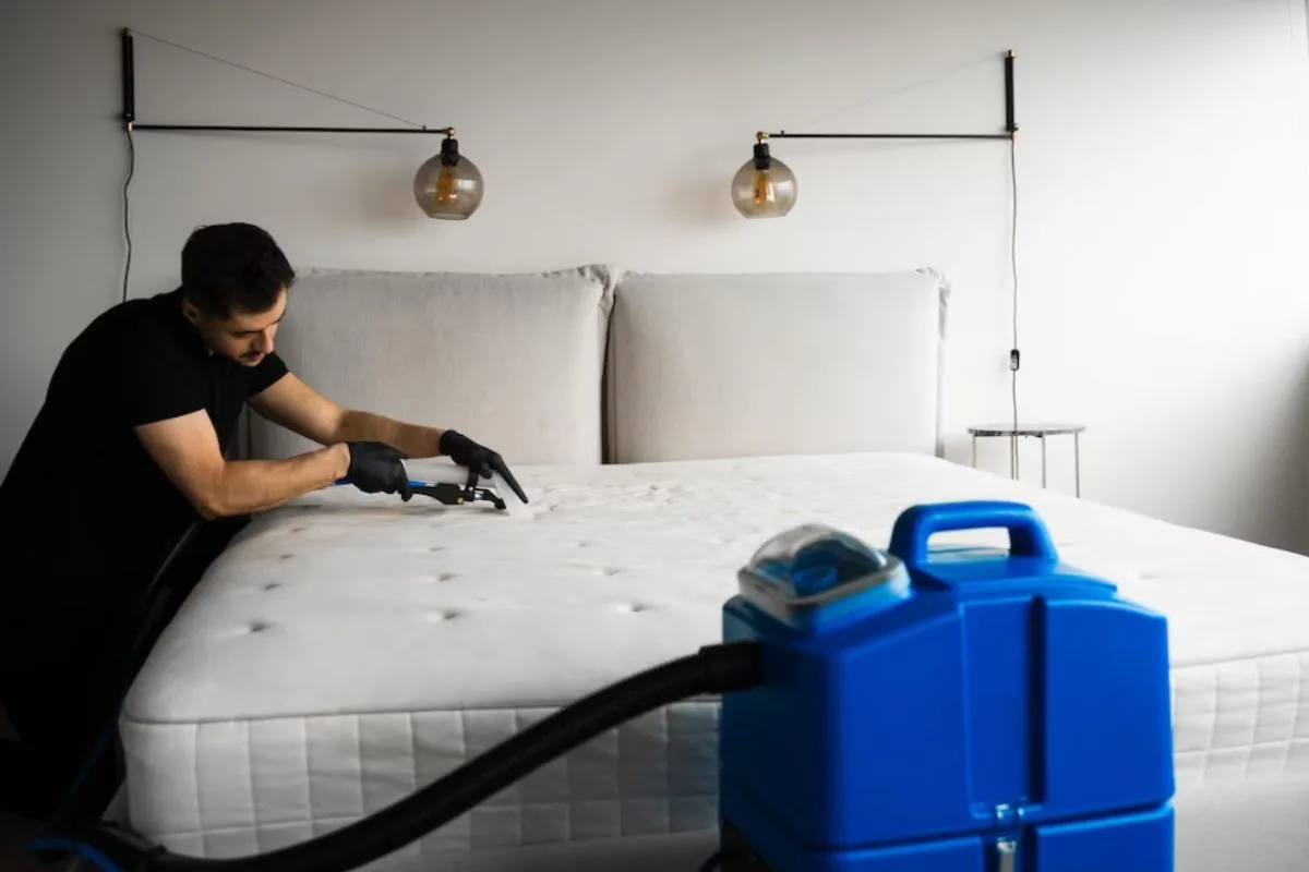Man testing a memory foam mattress in a showroom to compare comfort levels and overall mattress value