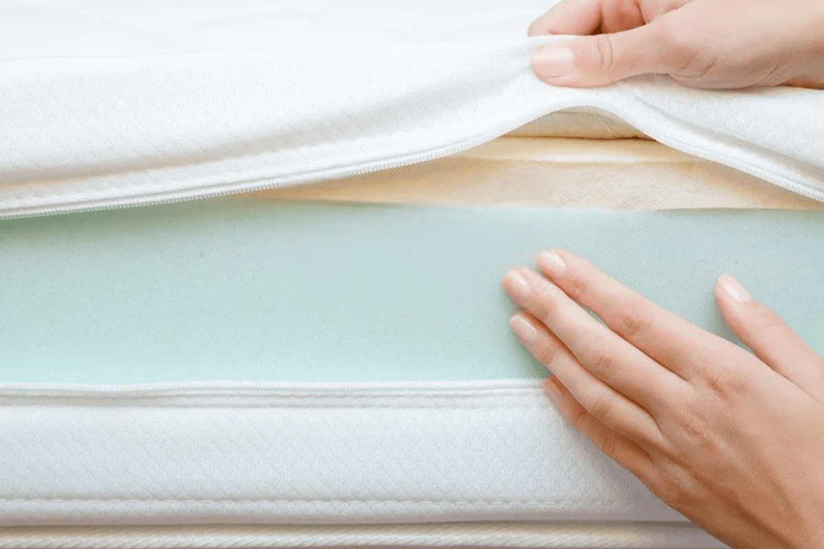 close-up of a mattress being unzipped plush vs firm mattress