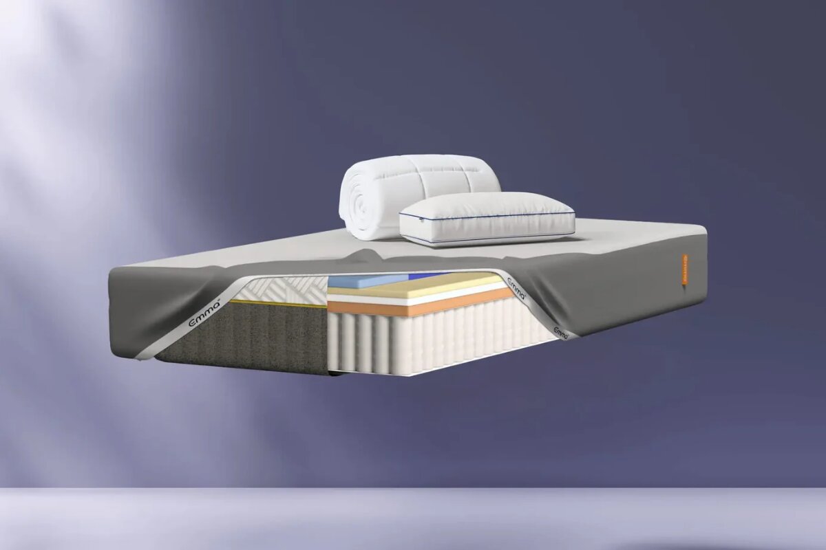 emma elite mattress cutaway with bedding showing breathable layers and airflow through foam and pocket spring support system