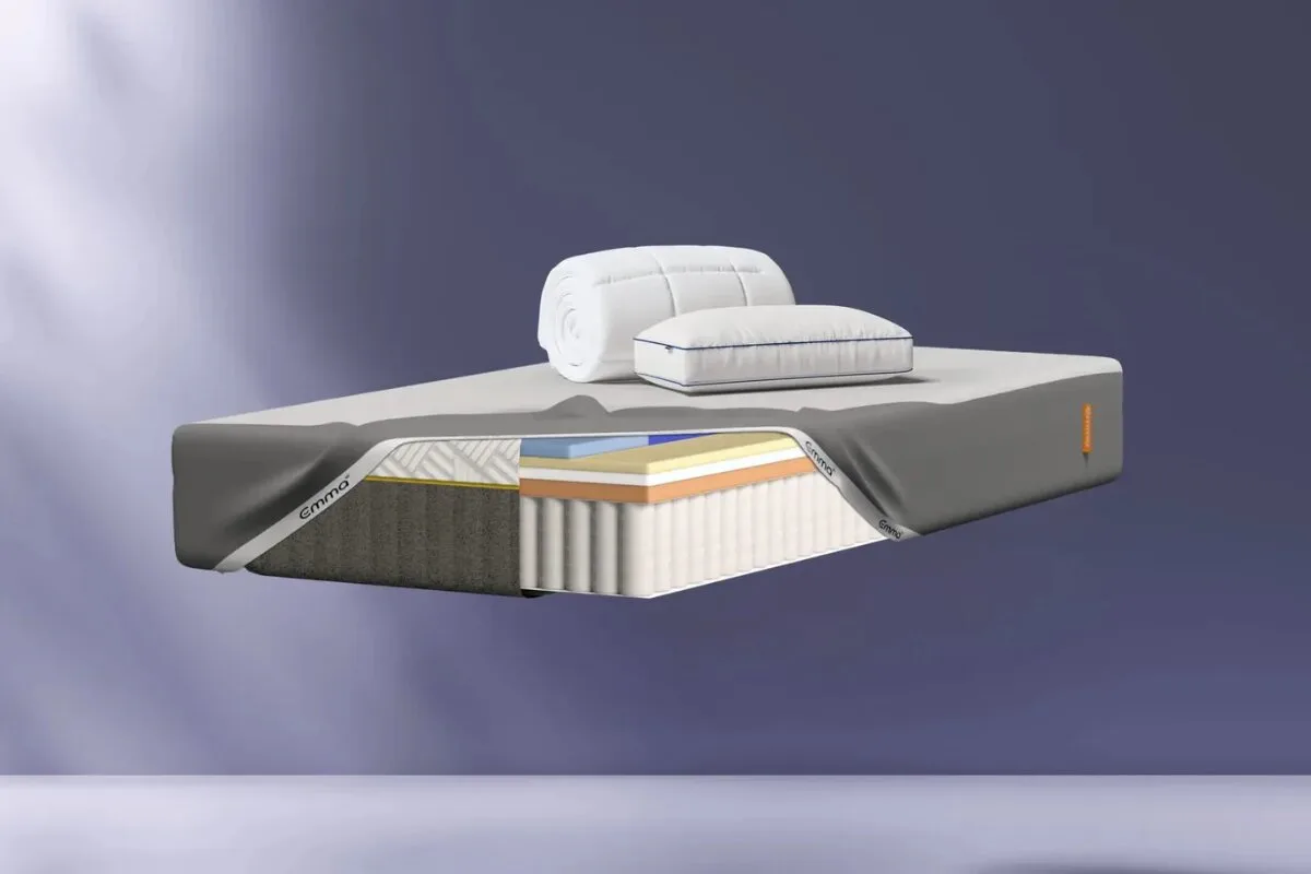 emma elite mattress cutaway with bedding showing breathable layers and airflow through foam and pocket spring support system