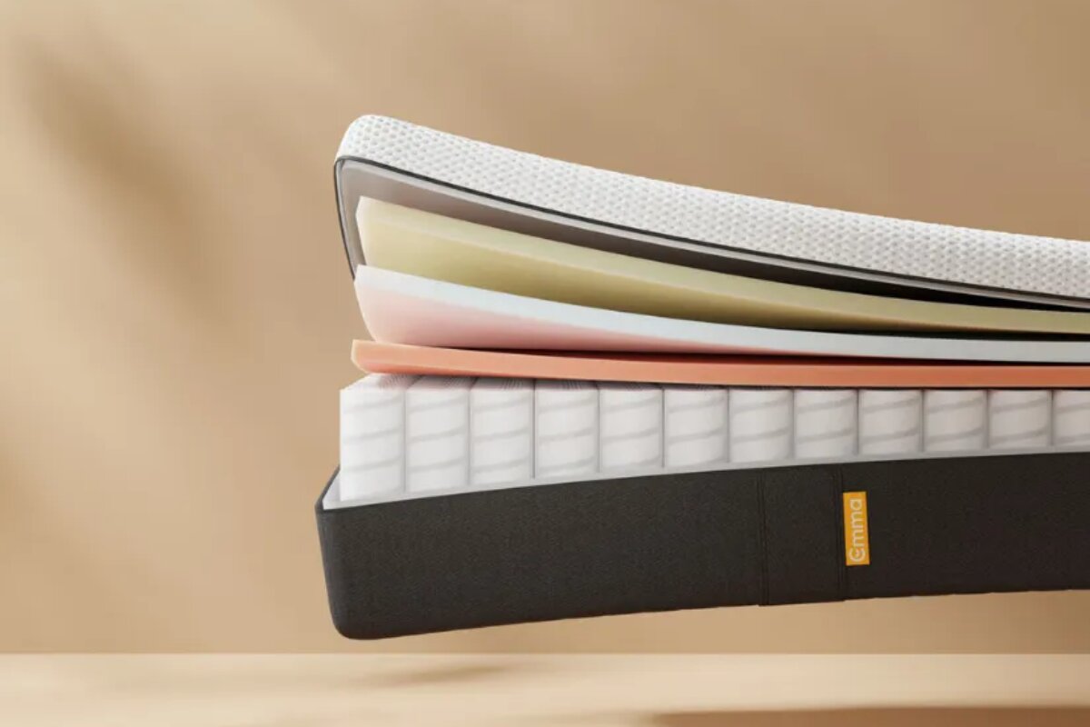 emma elite mattress cutaway showing layered foam and pocket spring support system for pressure relief and stability