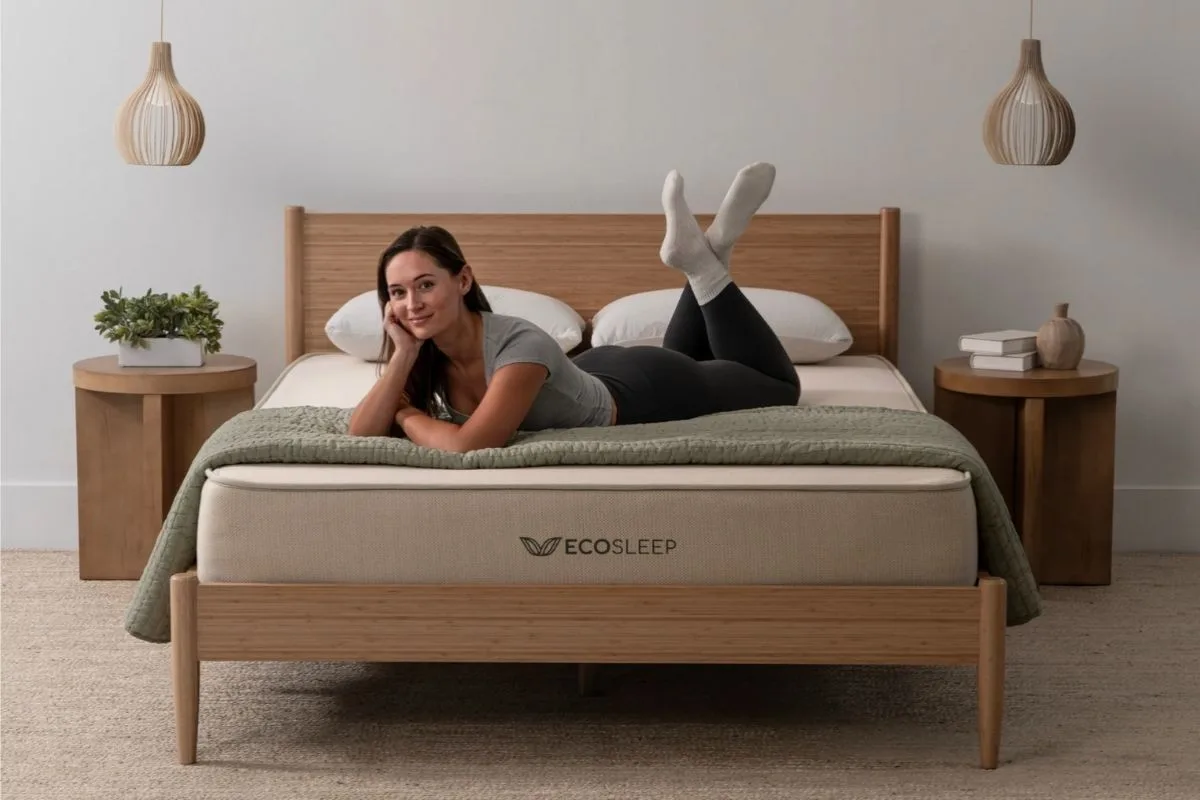 How Much Sleep Do I Need? Expert-Recommended Hours by Age Woman relaxing on a mattress, demonstrating how a comfortable sleep environment can help support healthy sleep duration