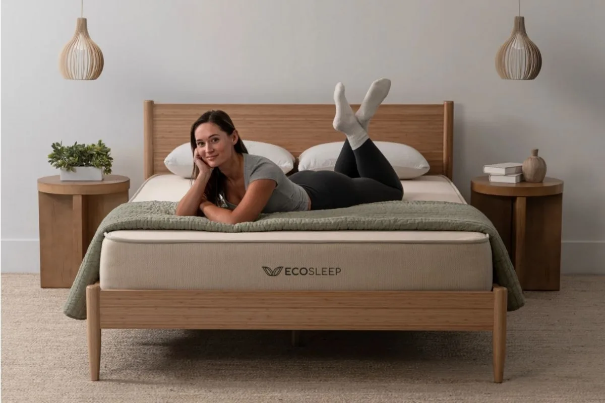 Sleeper relaxing on a supportive mattress, showing how the right mattress can promote spinal alignment and help manage upper back pain during sleep