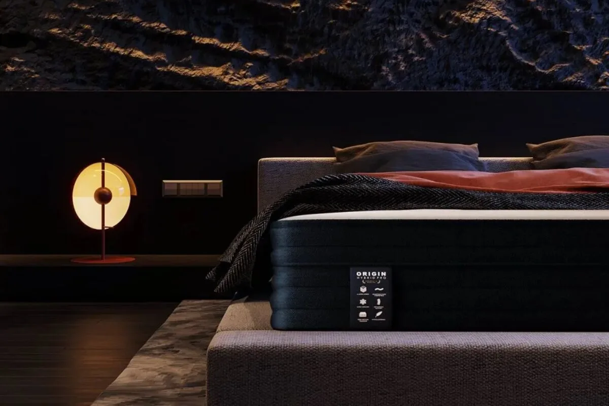 The Origin Hybrid Pro Mattress in bedroom lighting.