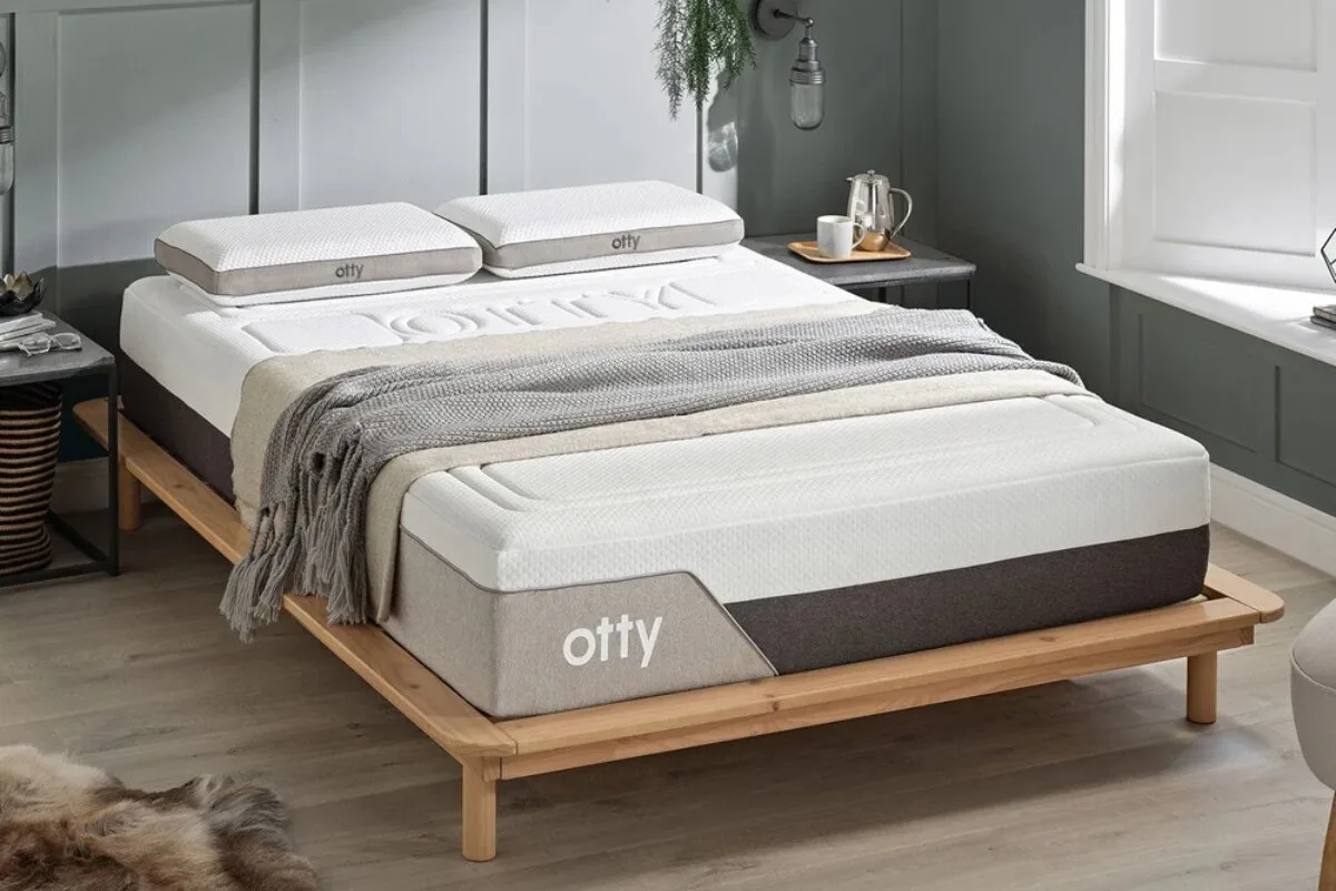 The OTTY Pure+ Hybrid 4000 Pocket Sprung Mattress on a bed frame.