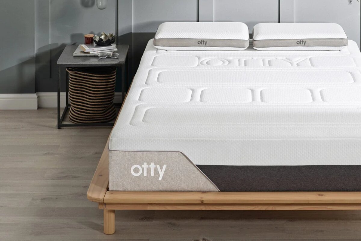 The OTTY Pure+ Hybrid 4000 Pocket Sprung Mattress on a bedframe.