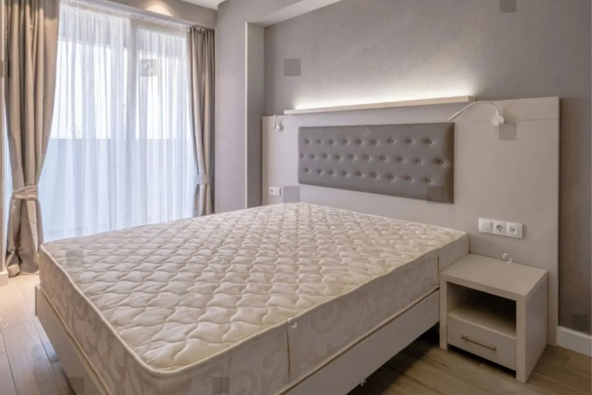 How Long Does a Memory Foam Mattress Take to Expand? Memory foam mattress fully expanded on a bed frame, showing the expected shape and height after the expansion process is complete