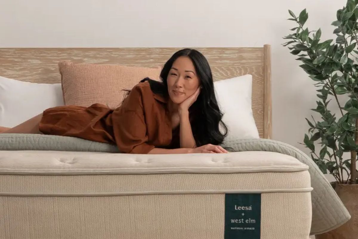 Customer lying on a Leesa Natural Hybrid Mattress during the trial period, illustrating how to evaluate comfort before deciding on a return