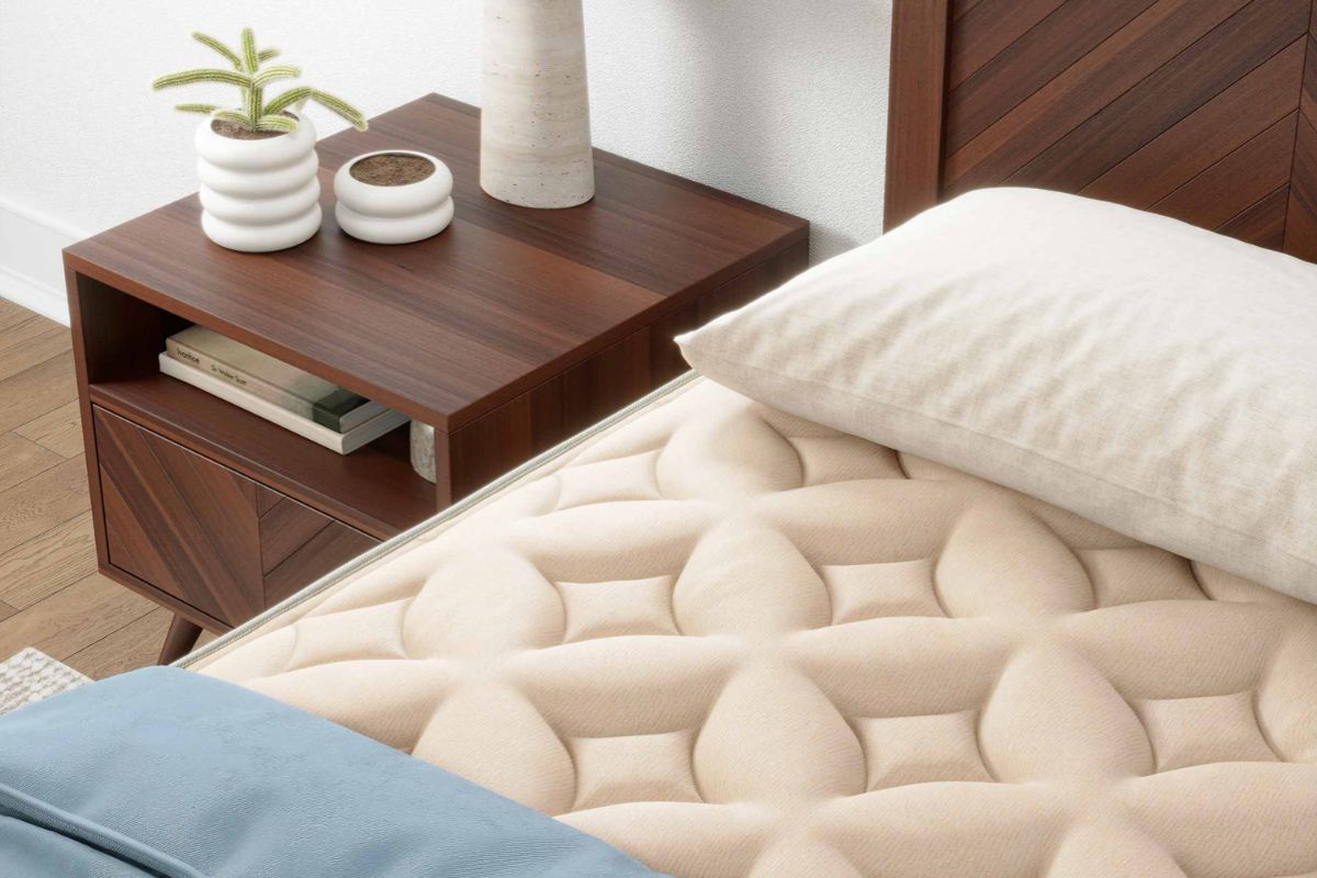 Close-up of a natural latex mattress surface, highlighting the premium quilted cover and materials often reviewed during the mattress return process