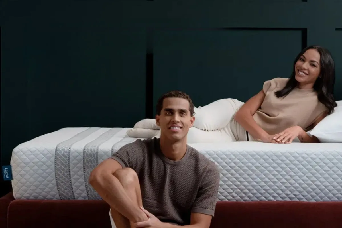 How to Fall Asleep Fast: Expert Tips and Techniques for Better Sleep Couple relaxing on a Leesa Sapira Hybrid Mattress that provides comfort and support for a better night's sleep