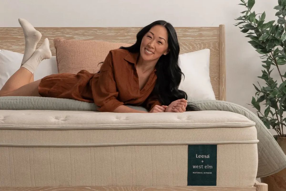 User lying on the Leesa Natural Hybrid Mattress, illustrating real-world comfort and first-hand mattress experiences