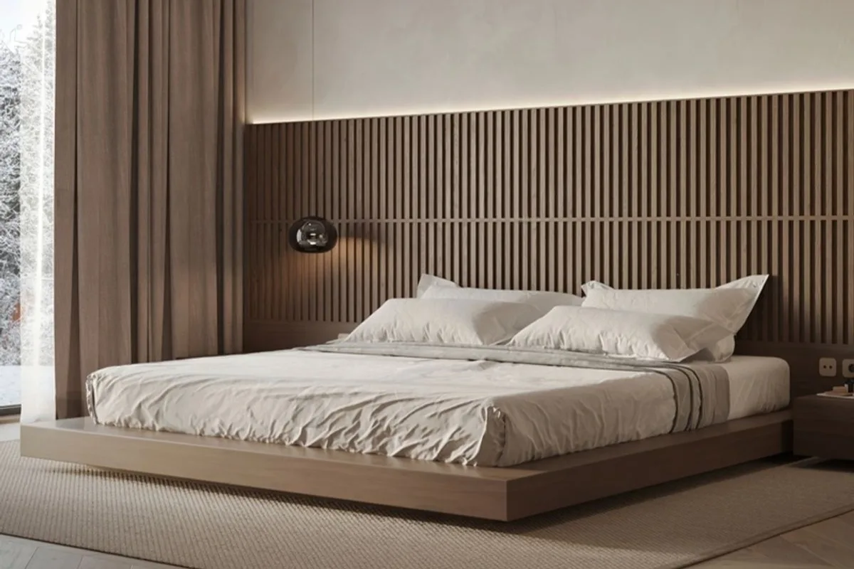 Can You Put An Adjustable Firmness Mattress On Any Bed? A bed in a well-lit room.