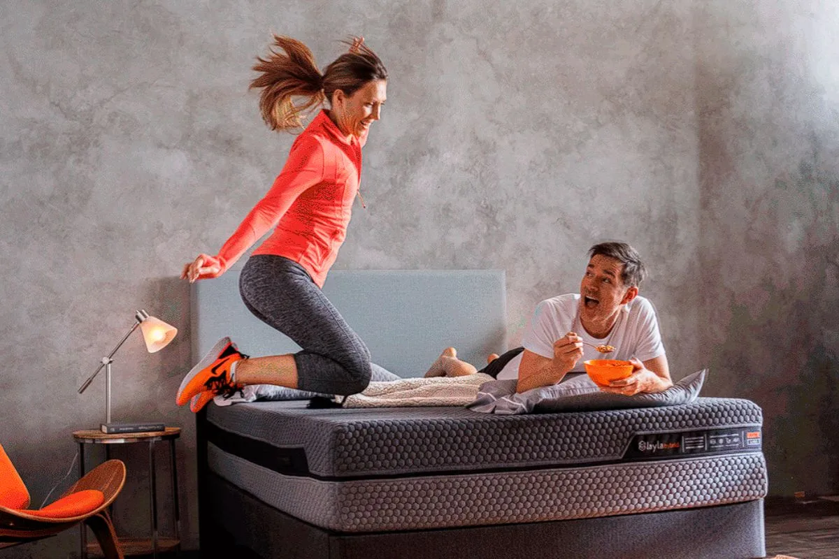 Couple testing motion isolation on the Layla Hybrid Mattress during the trial period to see how well it minimizes partner movement