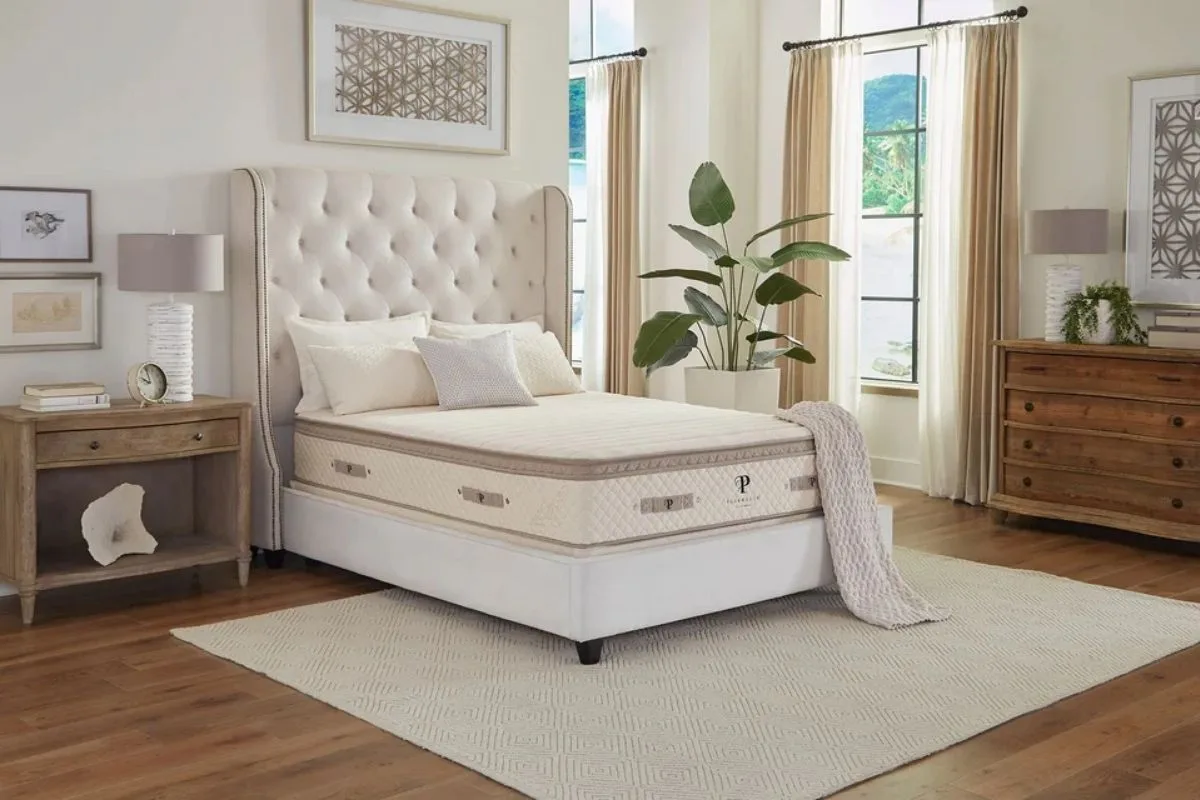 PlushBeds Luxury Bliss Hybrid Latex Mattress in a room.